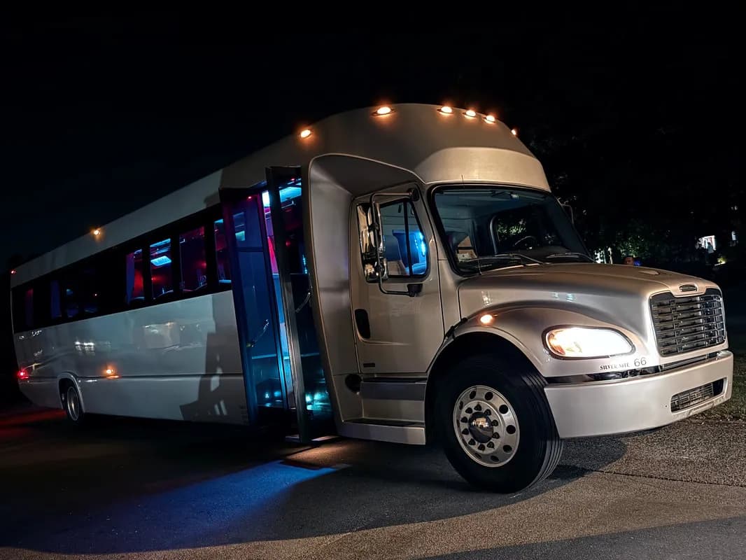 Silver Freightliner Party Bus exterior for party bus rental in North Attleboro, MA Silver Freightliner Party Bus exterior for party bus rental in North Attleboro, MA