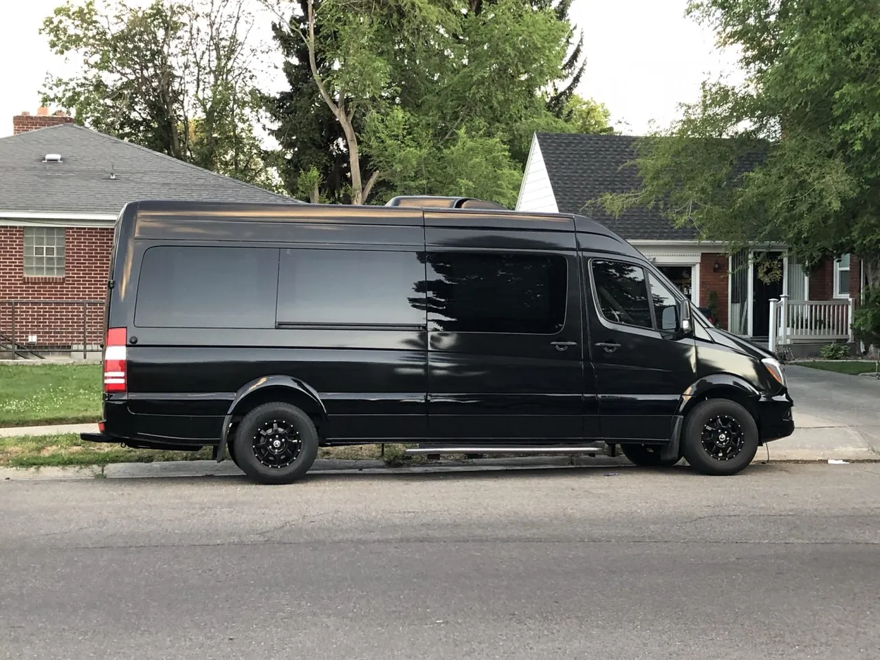 Black 12 Passenger Mercedes-Benz Party Bus for party bus rental