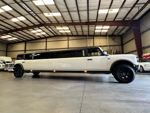 13 Passenger Bronco Limousine with Jet Door for hummer limo rental in Visalia, CA