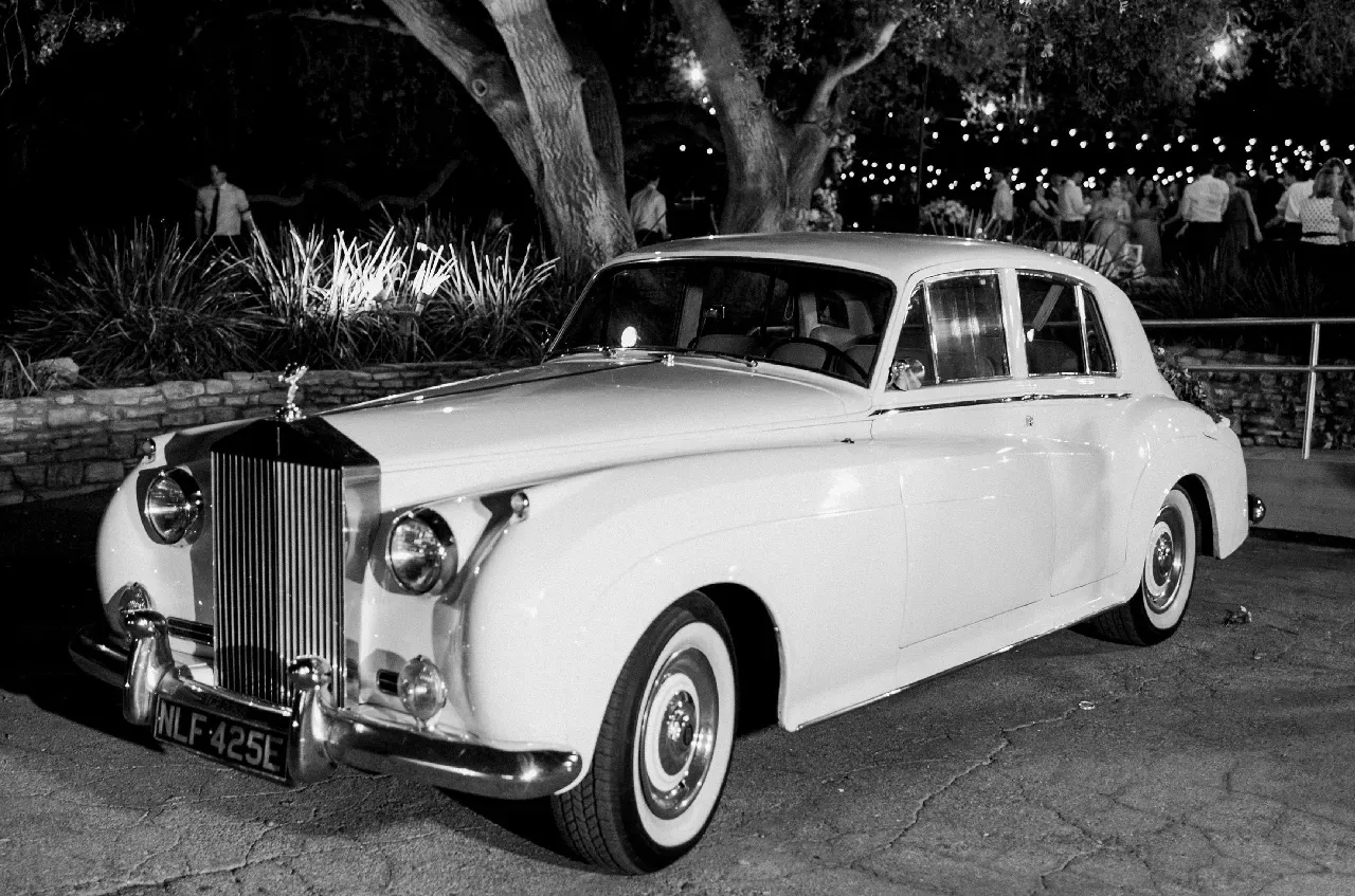 White 1960 Rolls-Royce Silver Cloud II for wedding car rental in Tarzana, CA