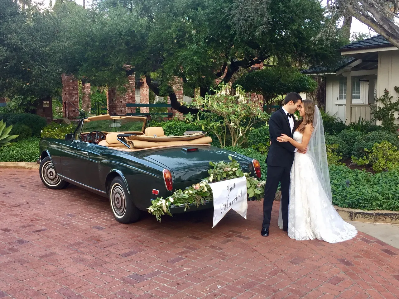 Green 1983 Rolls Royce Corniche Convertible exterior with convertible roof, photo 4 for wedding car rental in Burbank, CA