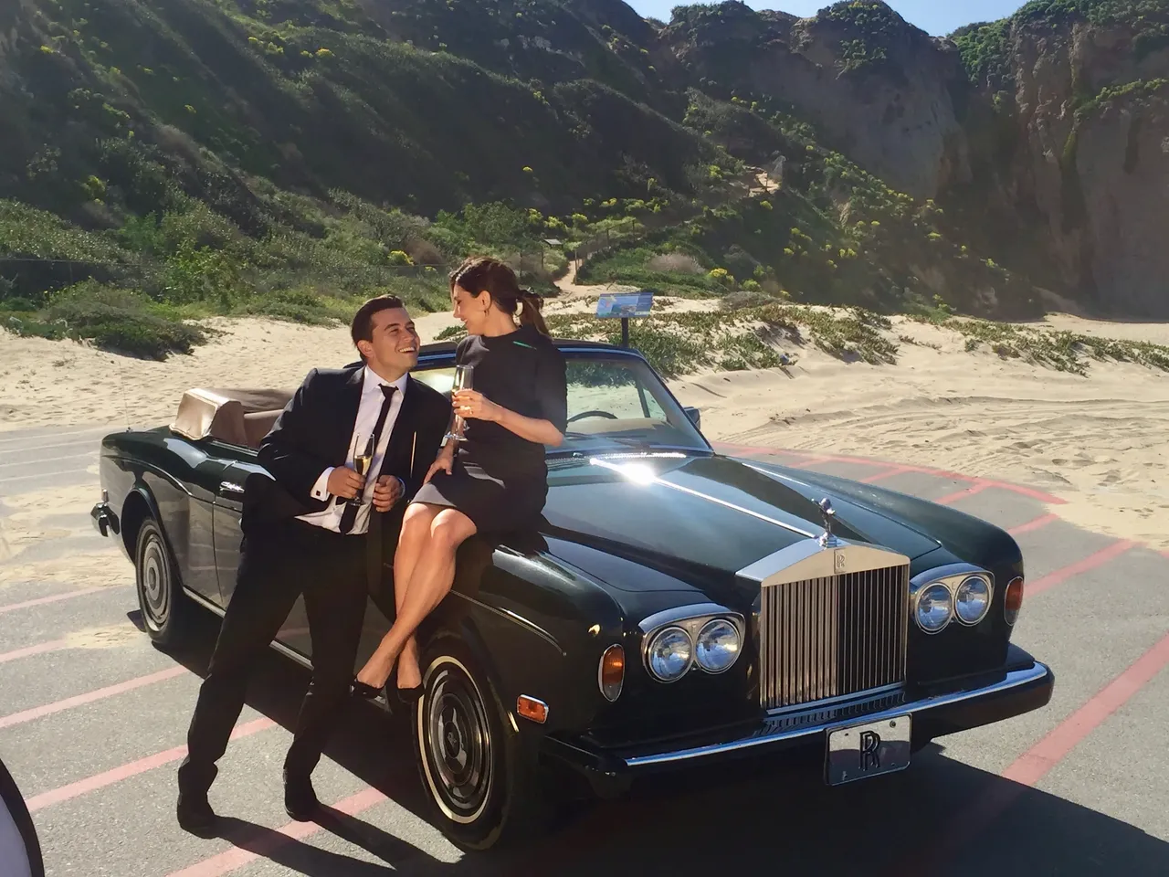 Green 1983 Rolls Royce Corniche Convertible exterior with convertible roof, photo 5 for wedding car rental in Burbank, CA