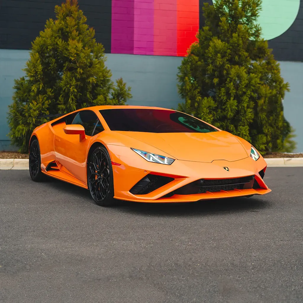 Orange 2022 Lamborghini Huracan EVO Arancia Atlas for wedding car rental in Rockville, MD Orange 2022 Lamborghini Huracan EVO Arancia Atlas for wedding car rental in Rockville, MD