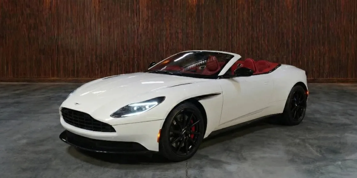 White Aston Martin DB11 exterior with convertible roof for wedding car rental in Hempstead, NY