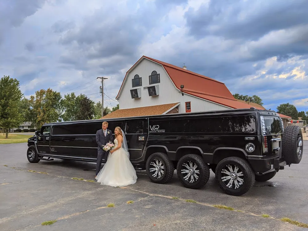 Black Hummer H2 Triple Axle Limousine for limo rental in Appleton, WI