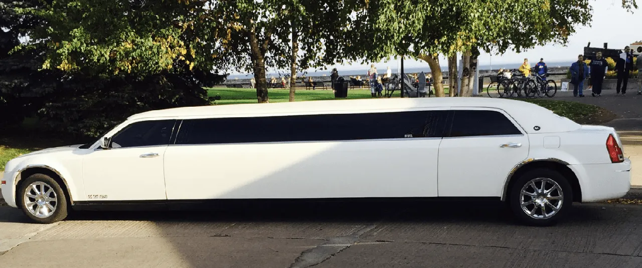 White C300 Limousine exterior with tinted windows for limo rental in Duluth, MN