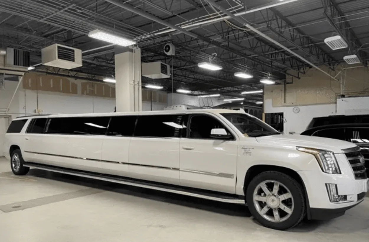 White Cadillac Escalade Limo — Cadillac Escalades