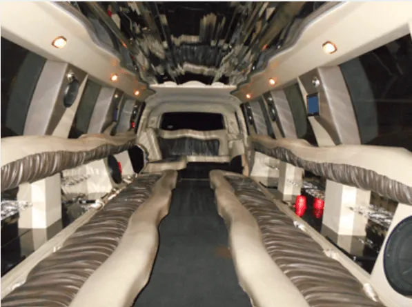 Passenger cabin: Cadillac Escalade Limousine; perimeter lounge seating and mirrored ceiling