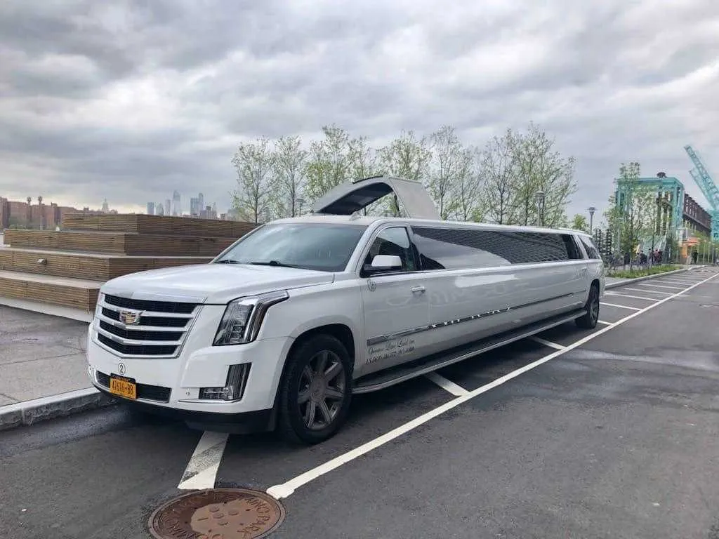 White Cadillac Escalade Limousine for limo rental in Vanceboro, ME