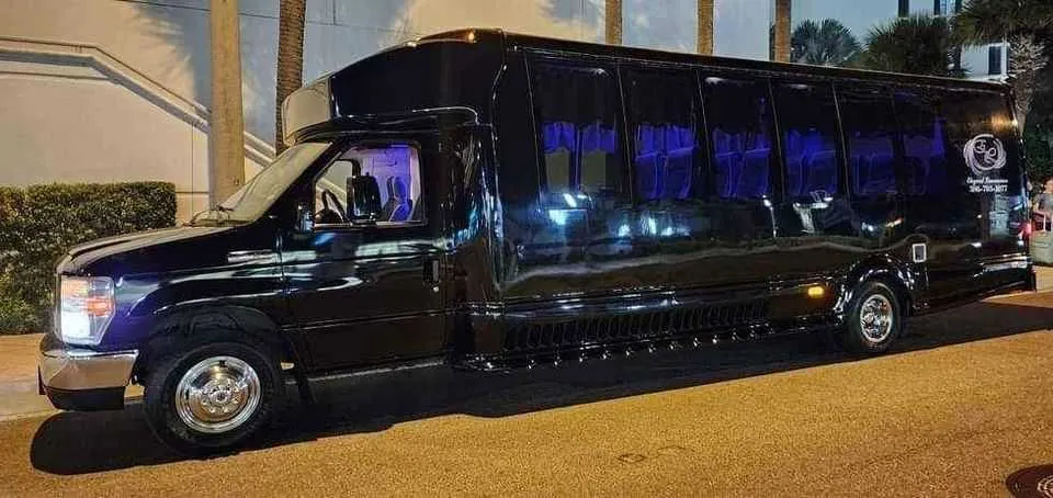 Black Dark Shadow /2019 ( 20 Passenger Luxury Party Bus exterior for party bus rental in Palm Coast, FL