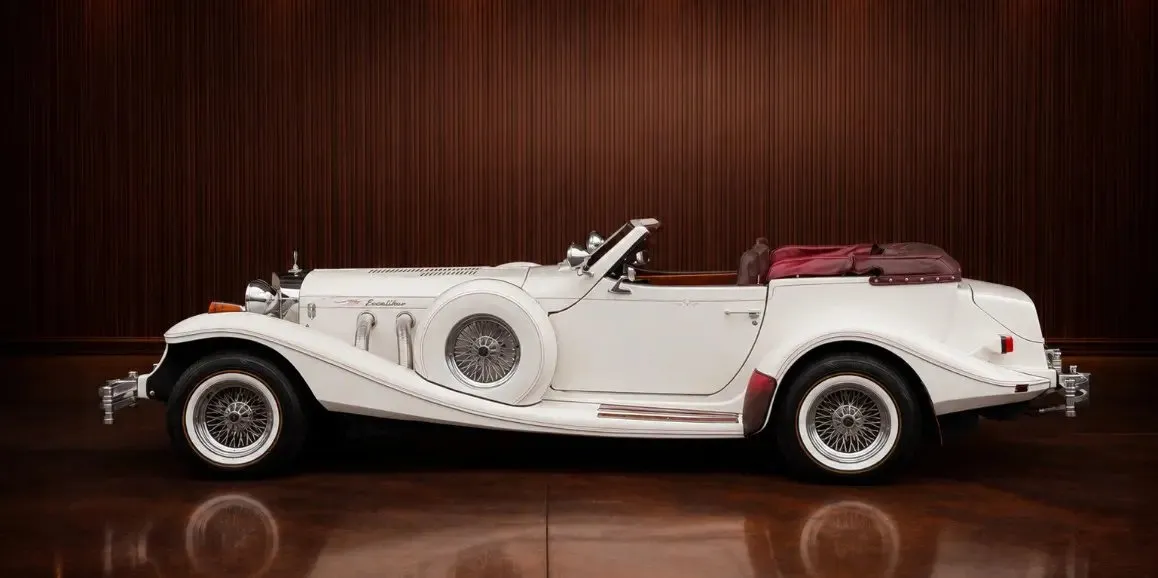 White Excalibur Phaeton (Vintage) exterior with convertible roof for wedding car rental in Toms River, NJ White Excalibur Phaeton (Vintage) exterior with convertible roof for wedding car rental in Toms River, NJ
