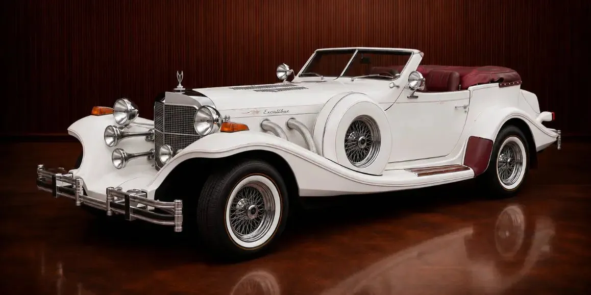 Excalibur Phaeton (Vintage) White Excalibur Phaeton (Vintage) with convertible roof for wedding car rental