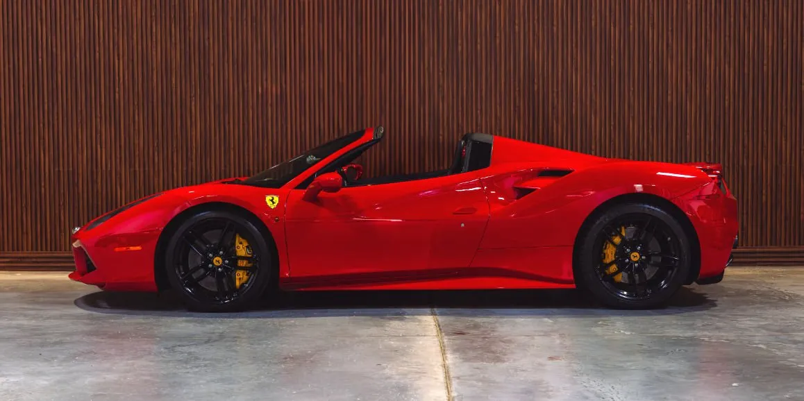 Red Ferrari 488 Spider exterior with convertible roof for wedding car rental in Nassau County, NY Red Ferrari 488 Spider exterior with convertible roof for wedding car rental in Nassau County, NY