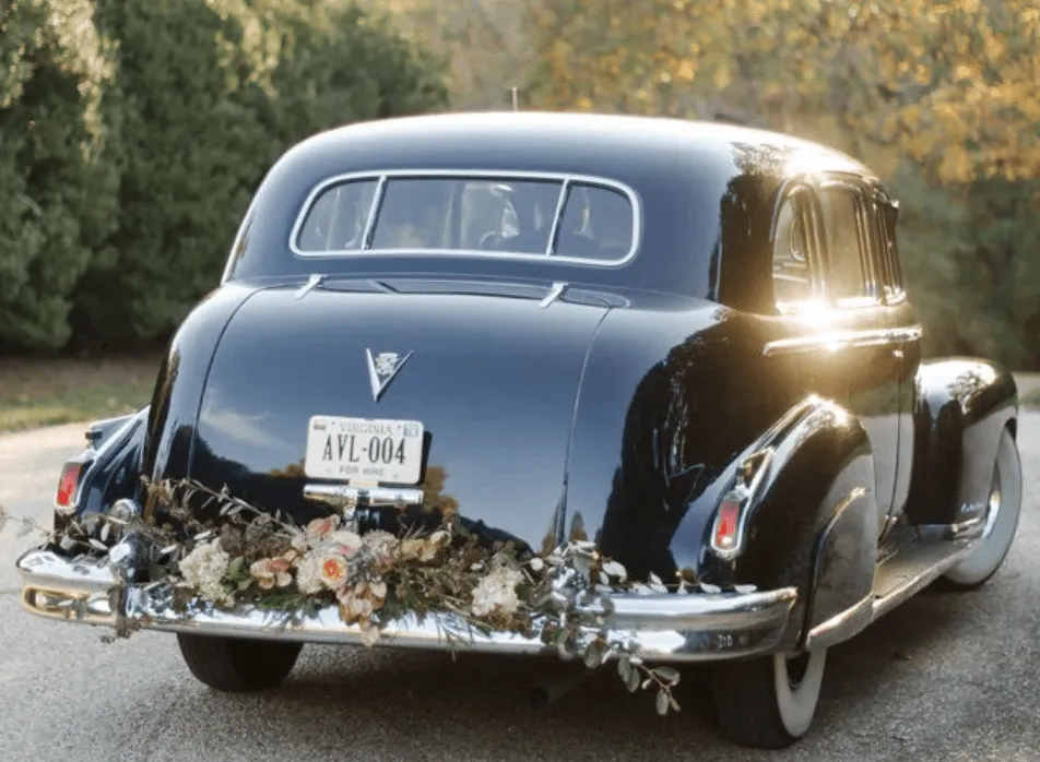 Blue Fleetwood Cadillac exterior for wedding car rental in Charlottesville, VA