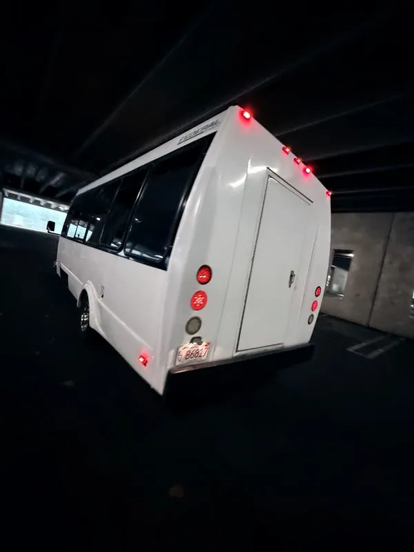 White Ford E-450 Series Party Bus exterior, photo 11 for party bus rental in North Attleboro, MA