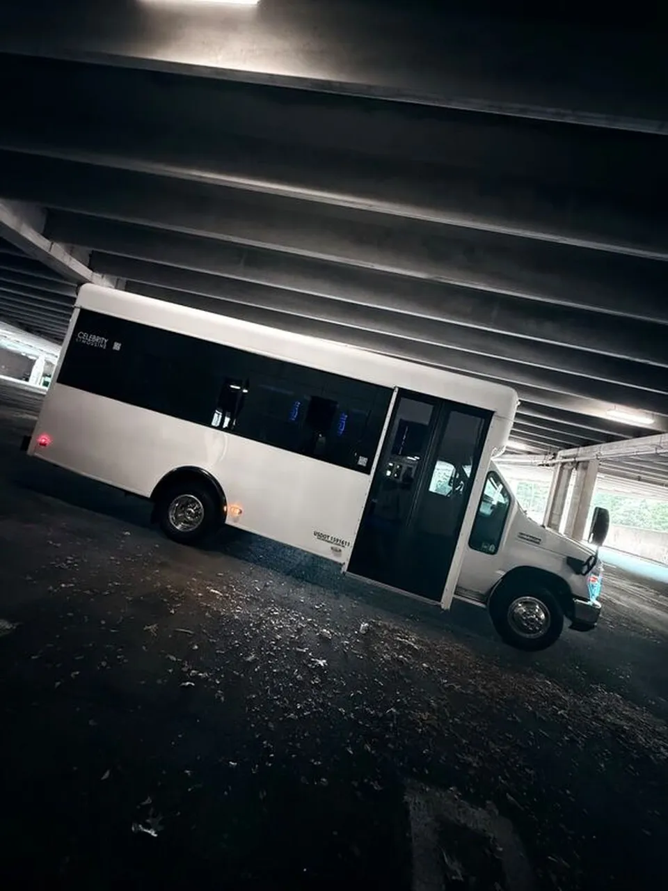 White Ford E-450 Series Party Bus exterior for party bus rental in North Attleboro, MA