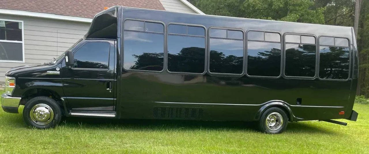 Black Ford Party Bus exterior for party bus rental in Kentucky Black Ford Party Bus exterior for party bus rental in Kentucky
