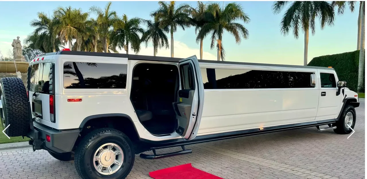 White Hummer H2 15 Pass for hummer limo rental in Pinetta, FL