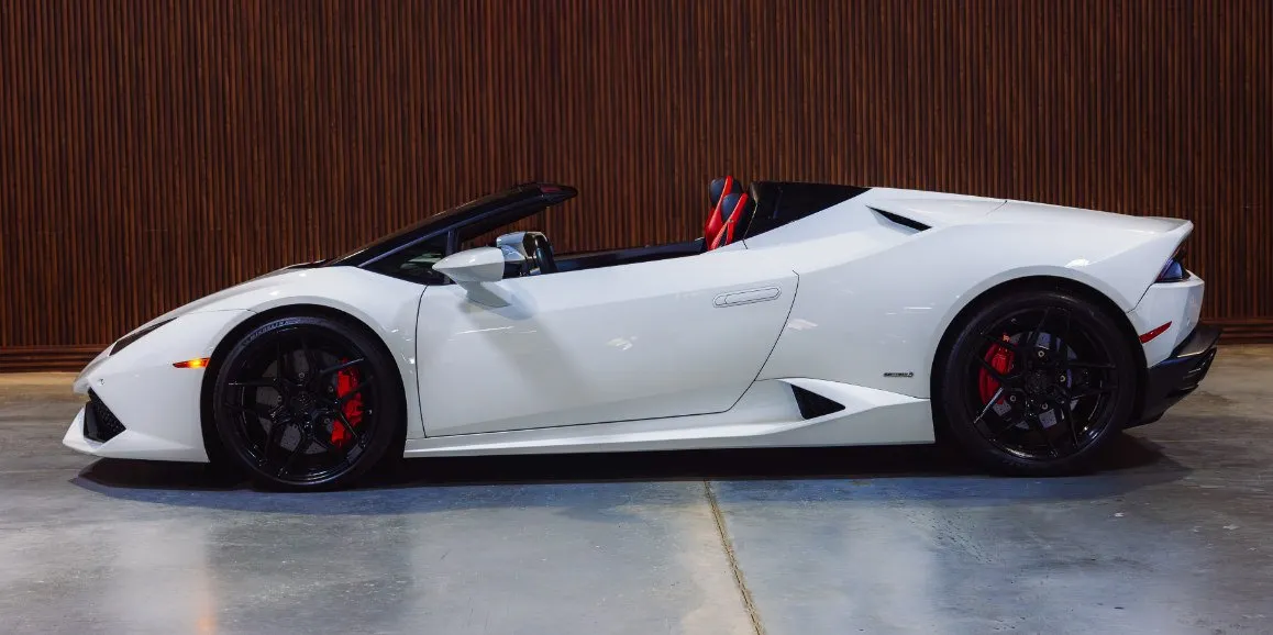 White Lamborghini Huracan exterior with convertible roof for wedding car rental in Deer Park, NY