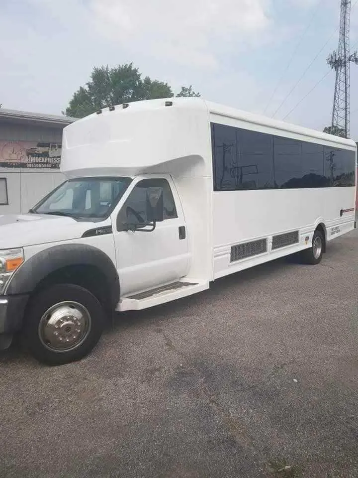 Silver Limousine Bus exterior with tinted windows, photo 6 for party bus rental in Memphis, TN