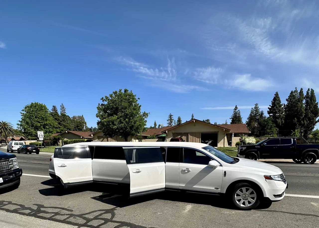White Lincoln MKT Limo exterior, photo 3 for limo rental in Davis, CA