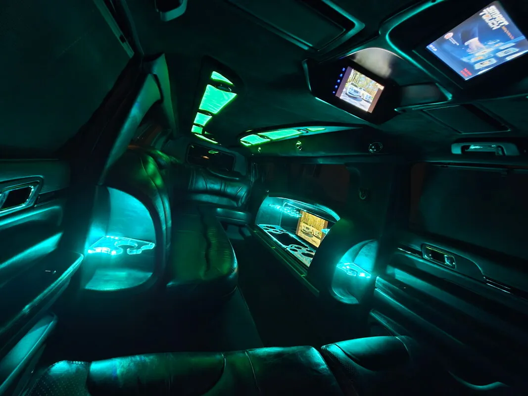 Lincoln MKT Limousine interior with LED accent lighting and TV screens, photo 5 for limo rental in North Attleboro, MA