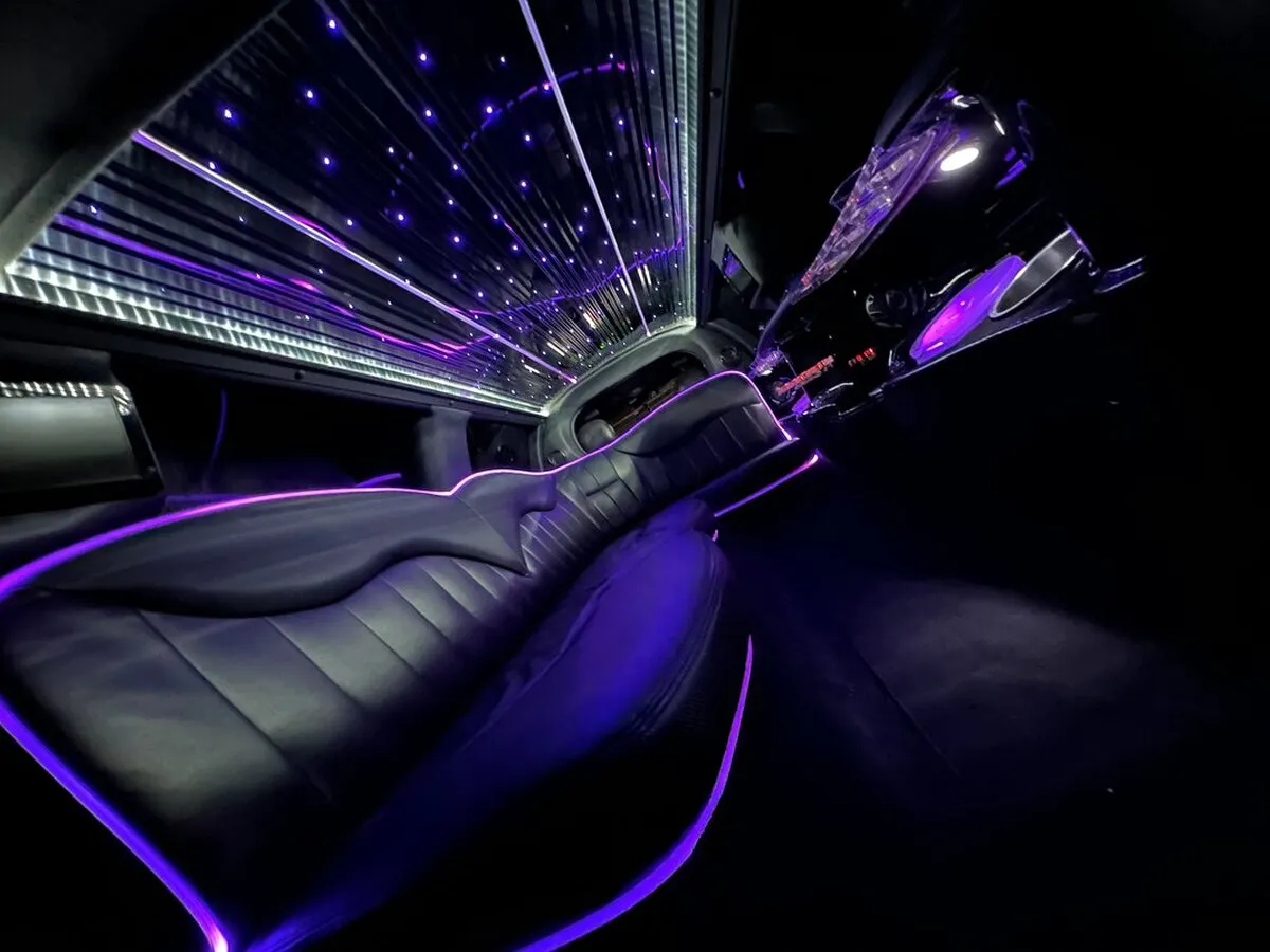Lincoln Town Car Limousine interior with LED accent lighting, LED ceiling lighting and starlight or fiber-optic ceiling, photo 9 for limo rental in North Attleboro, MA
