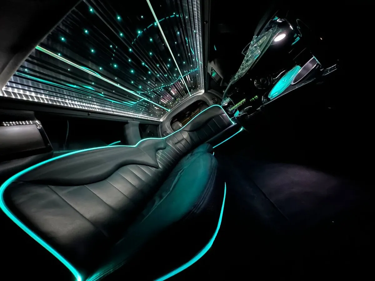 Lincoln Town Car Limousine interior with LED accent lighting, LED ceiling lighting and starlight or fiber-optic ceiling, photo 8 for limo rental in North Attleboro, MA