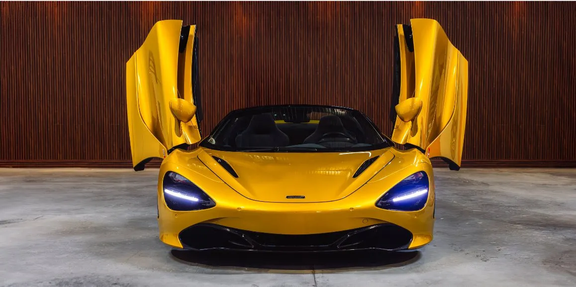 Yellow McLaren 720S exterior with convertible roof for wedding car rental in West Hempstead, NY