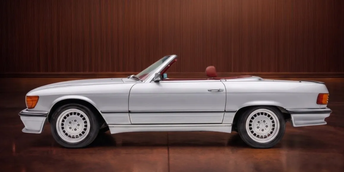 Silver Mercedes-Benz 450 SL exterior with convertible roof for wedding car rental in Toms River, NJ Silver Mercedes-Benz 450 SL exterior with convertible roof for wedding car rental in Toms River, NJ