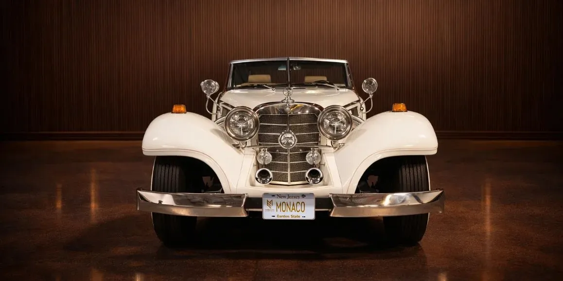 White Mercedes-Benz 500K exterior with convertible roof for wedding car rental in Toms River, NJ White Mercedes-Benz 500K exterior with convertible roof for wedding car rental in Toms River, NJ