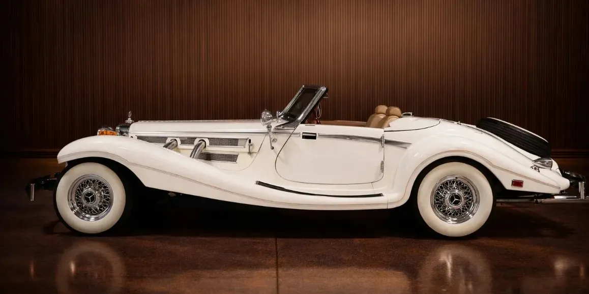 White Mercedes-Benz 500K exterior with convertible roof, photo 3 for wedding car rental in Toms River, NJ White Mercedes-Benz 500K exterior with convertible roof, photo 3 for wedding car rental in Toms River, NJ
