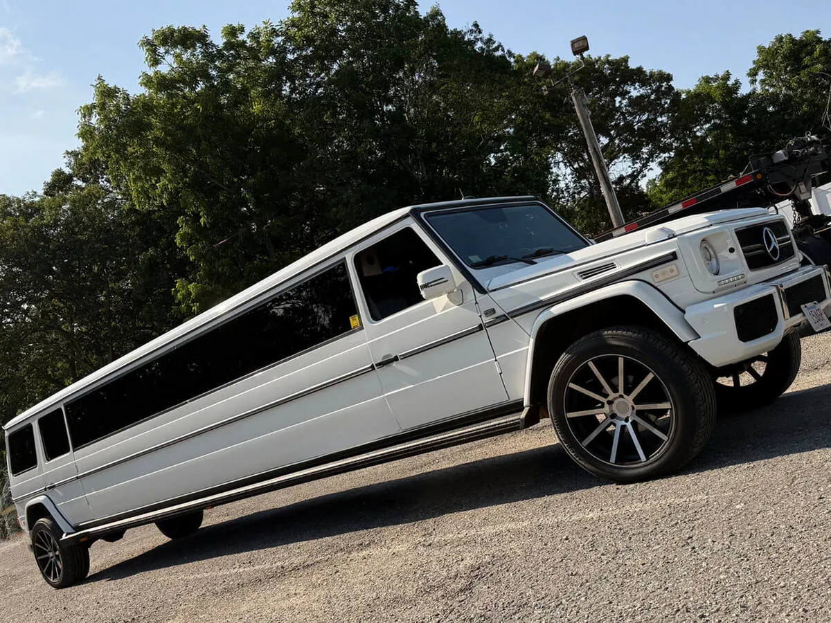 White Mercedes G Wagon with tinted windows for limo rental