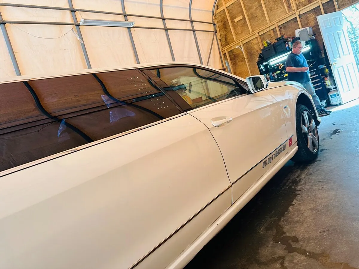 White Mercedes-Benz Jet Doors Limousine exterior with tinted windows, photo 6 for limo rental in North Attleboro, MA