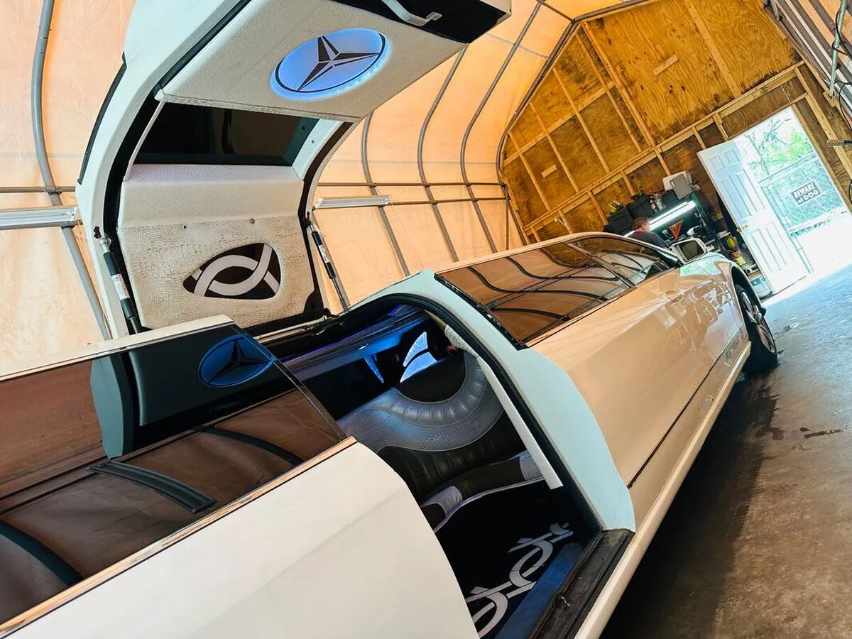 White Mercedes-Benz Jet Doors Limousine with bridal (jet) door for limo rental in North Attleboro, MA