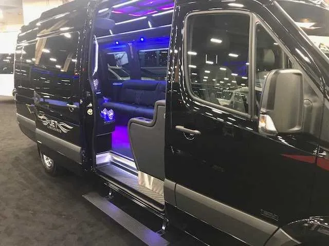 Black Mercedes-Benz Party Bus exterior for prom car rental in Burson, CA