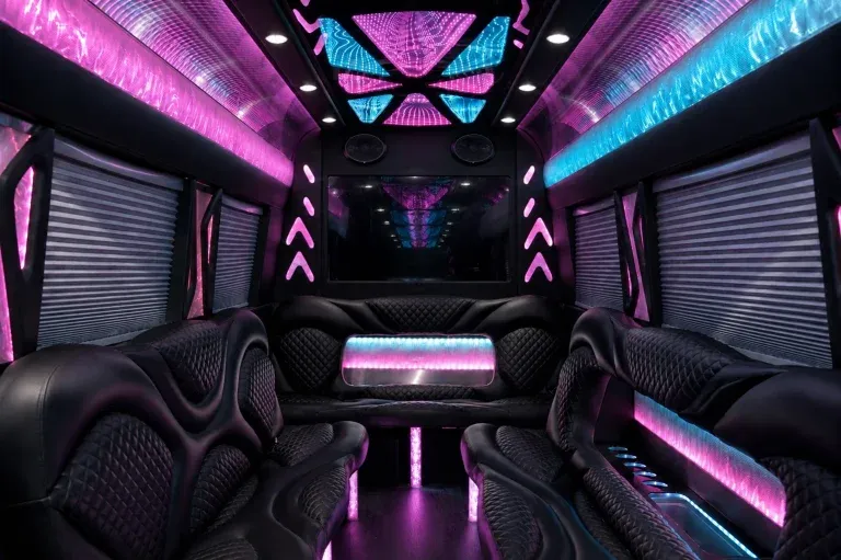 Mercedes-Benz Sprinter Limousine interior with perimeter lounge seating, window shades and LED accent lighting, photo 3 for party bus rental in El Paso, TX