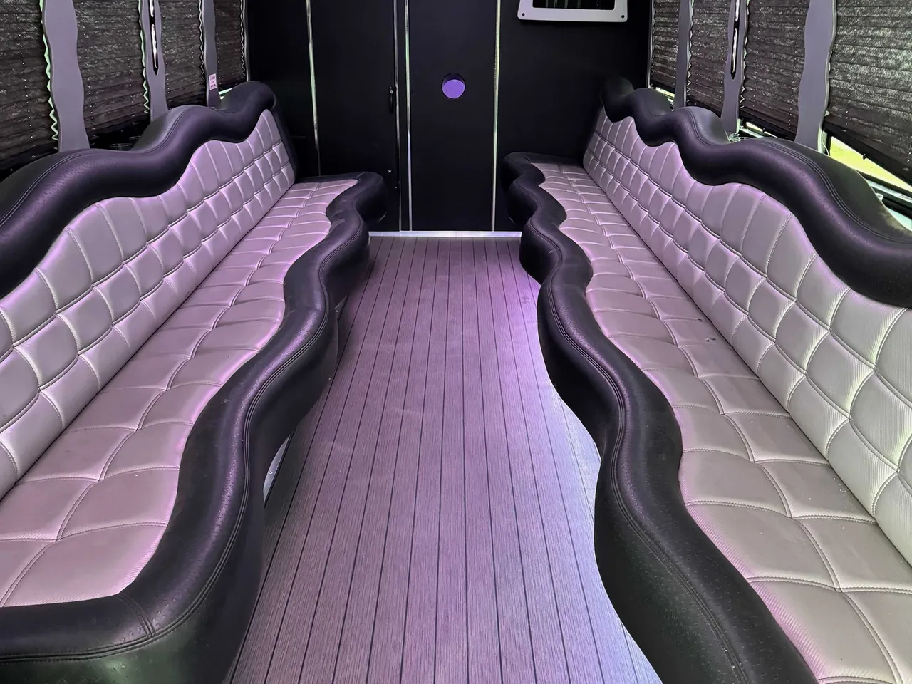 White 24 Passenger Party Bus; view 2