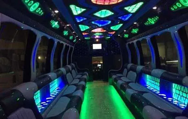 Party Bus Black Passenger cabin: Party Bus Black; perimeter lounge seating, LED accent lighting and LED ceiling lighting