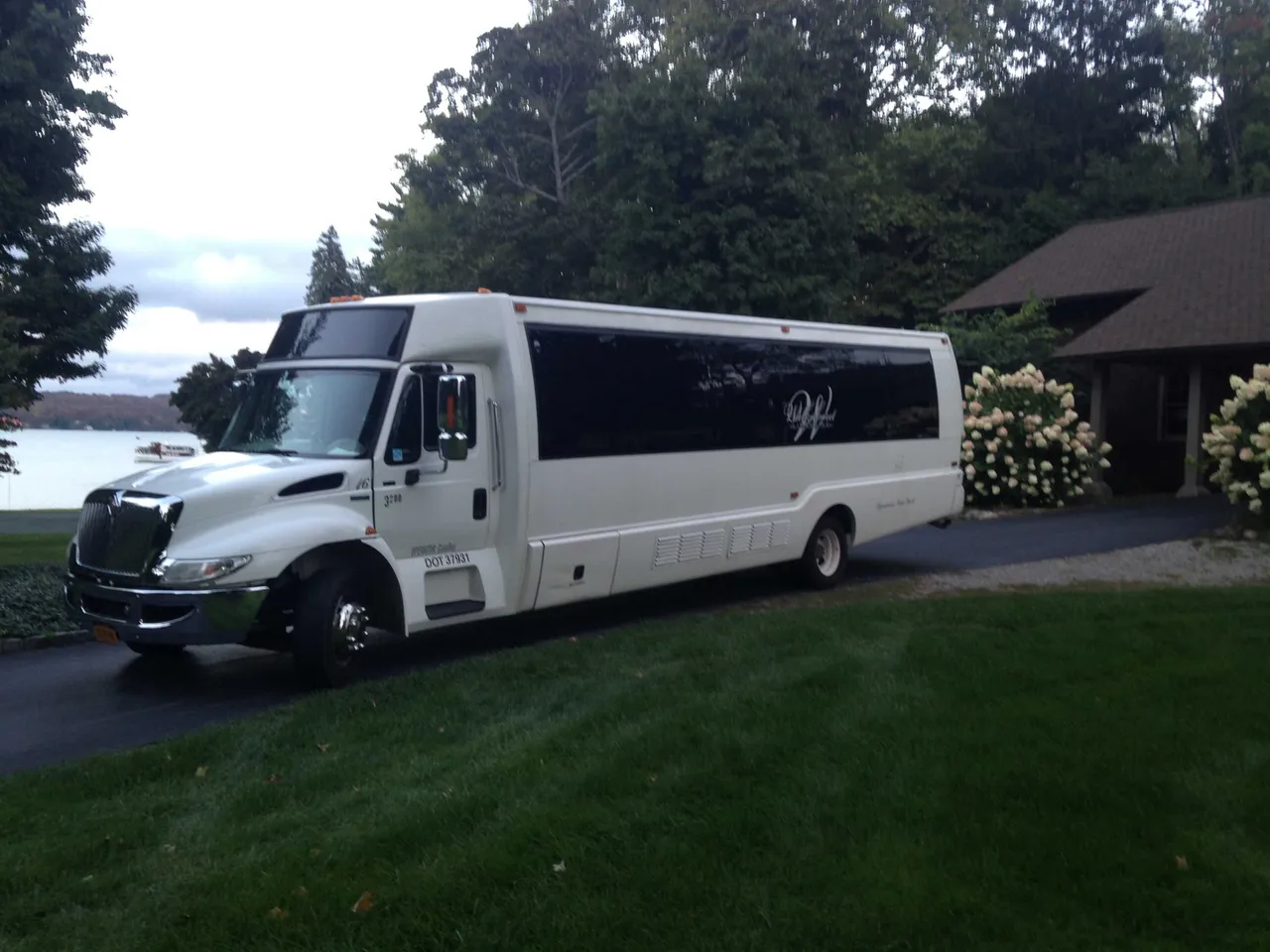 White Party Bus - Dean Martin with tinted windows for party bus rental