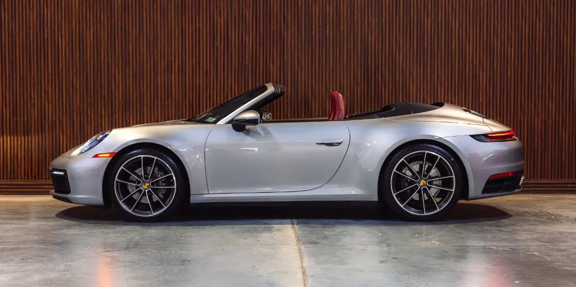 Silver Porsche 911 exterior with convertible roof for wedding car rental in Hempstead, NY