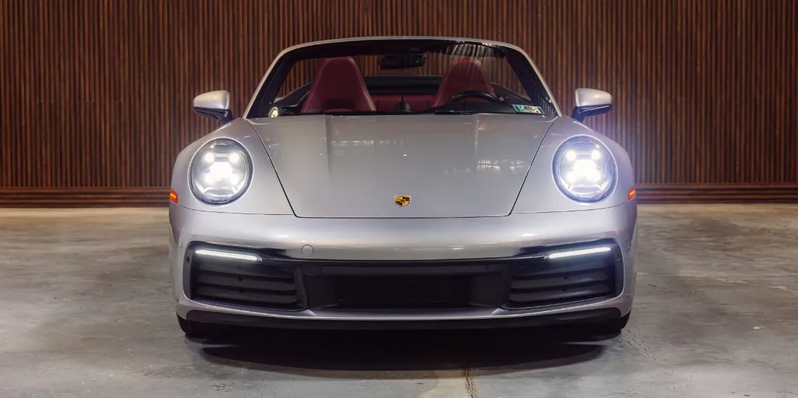 Silver Porsche 911 exterior with convertible roof, photo 3 for wedding car rental in Hempstead, NY