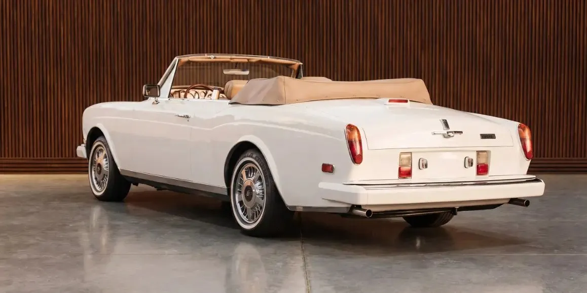 White Rolls-Royce Corniche 1975 exterior with convertible roof, photo 3 for limo rental in Toms River, NJ