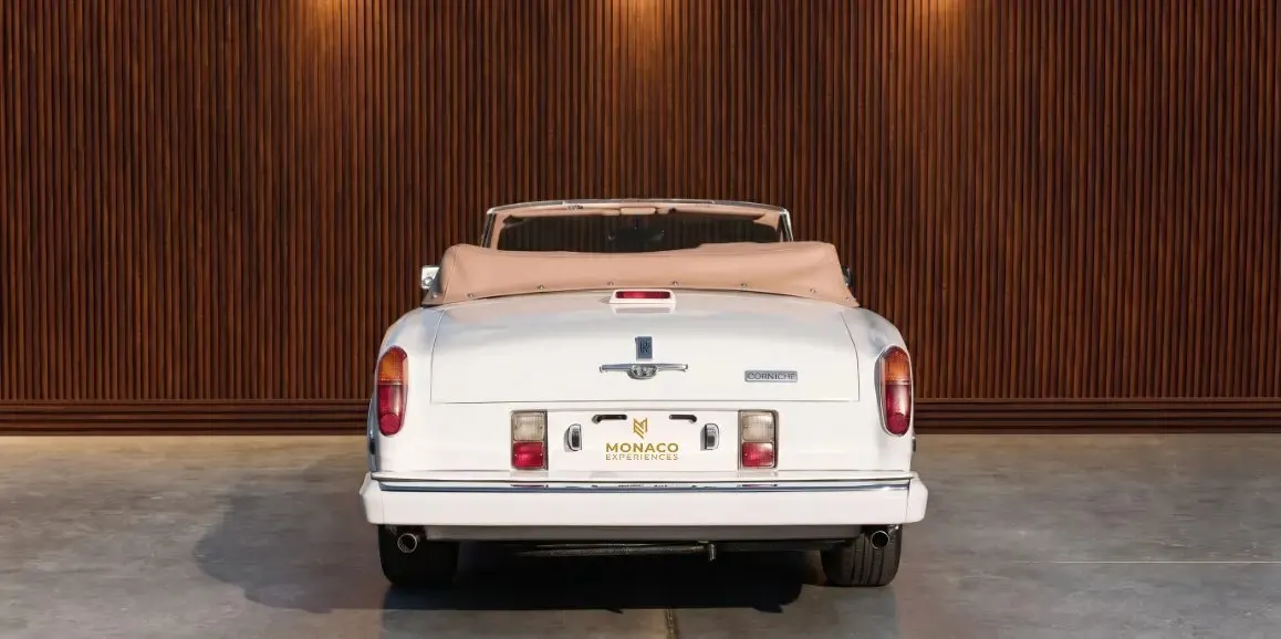 White Rolls-Royce Corniche 1975 exterior with convertible roof, photo 4 for limo rental in Toms River, NJ