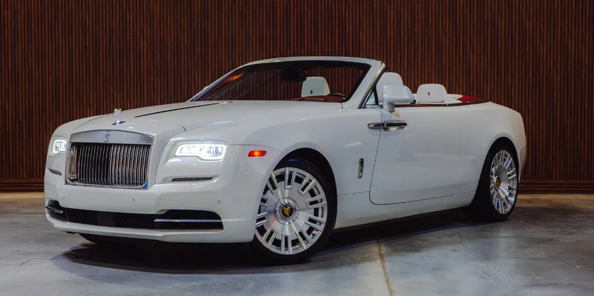 White Rolls-Royce Dawn with convertible roof for limo rental in Toms River, NJ