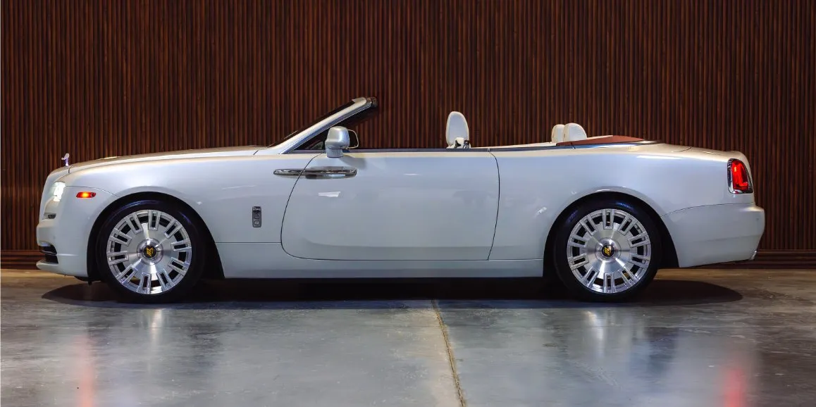 White Rolls-Royce Dawn exterior with convertible roof for limo rental in Toms River, NJ
