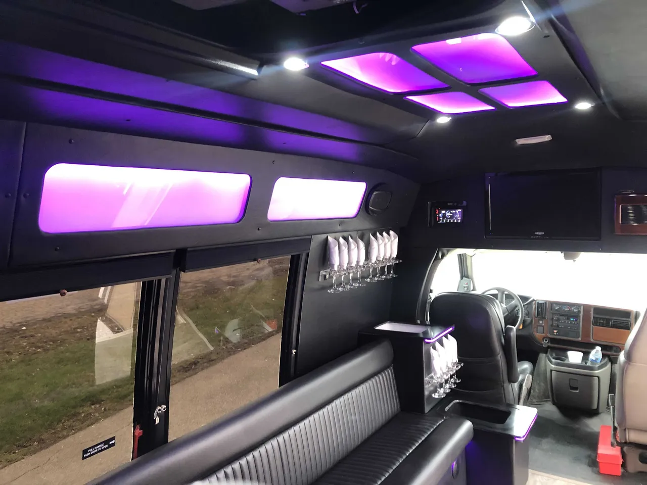 Small party bus interior, photo 2 for party bus rental in Palm Coast, FL