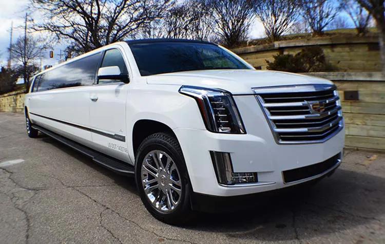 White Cadillac Escalade Stretch Limousine for limo rental in Farmington, MI
