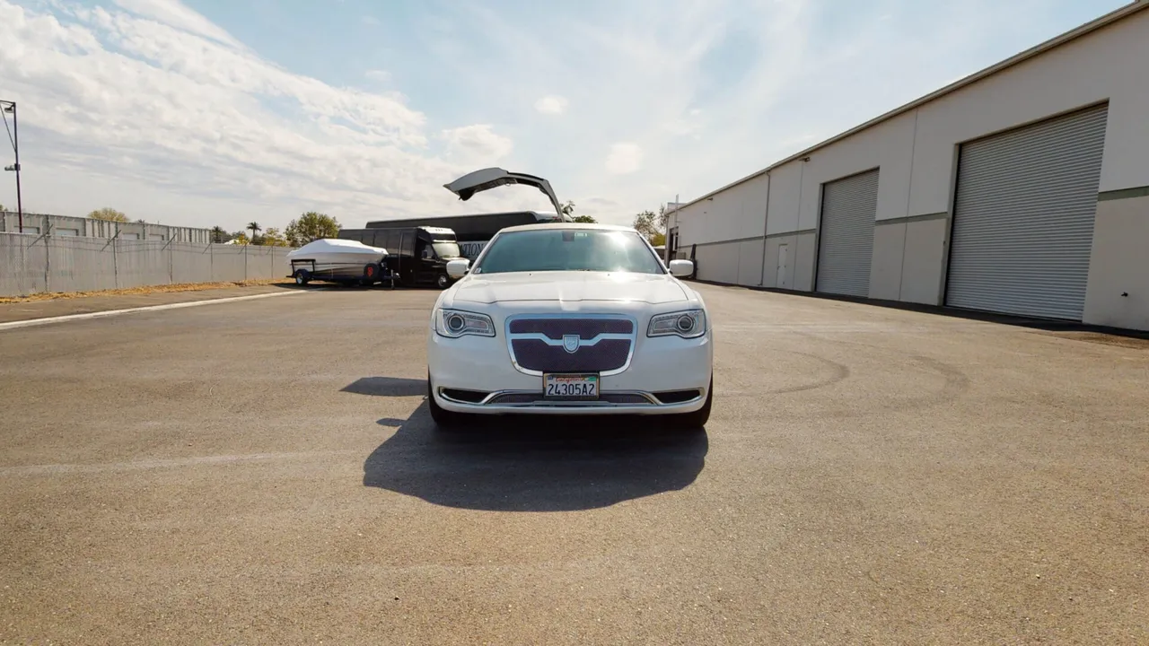 White Chrysler 300 Stretch Limousine for pink limo rental in Sacramento, CA